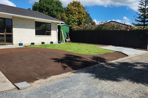 The old removed and the new top soil in place.