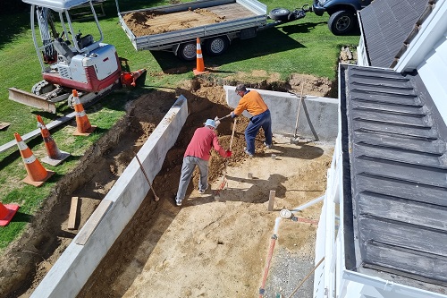Earth moved and positioned for the base of the steps accessing the courtyard.
