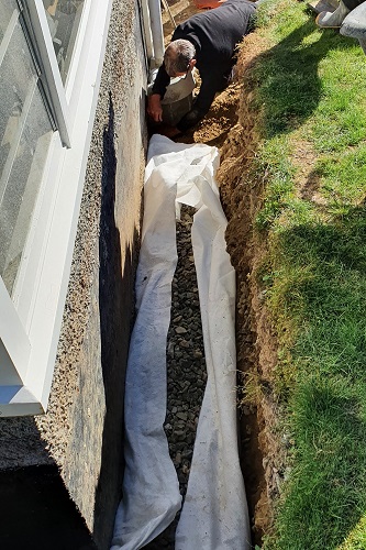 Trench for pipe repairs dug out