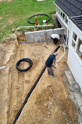 Trench for pipe repairs dug out